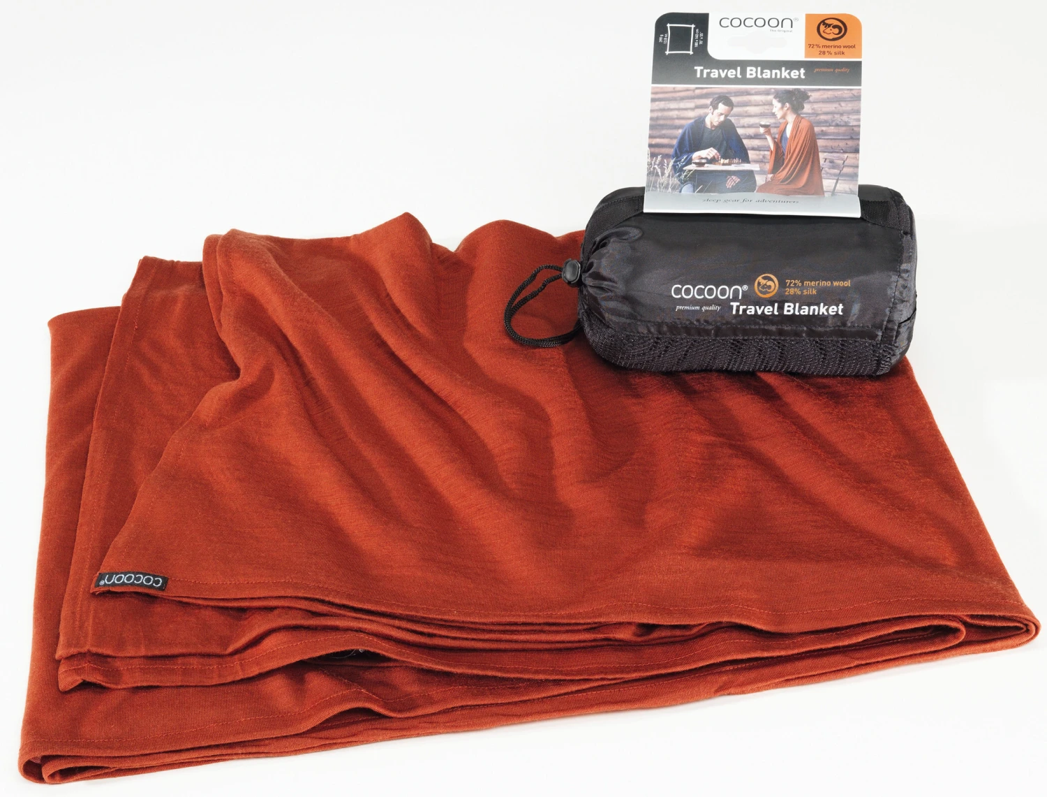 Cocoon Reisdeken Merino Wol/Zijde, oranje Cocoon Reisdeken Merino Wol/Zijde, Oranje -Kampeer Sport Winkel cocoon travel blanket merino wool silk dark terracotta 1